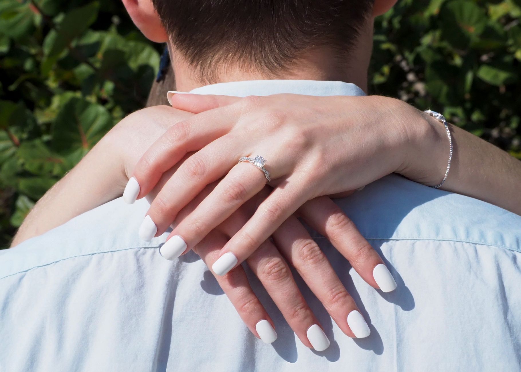 engagement ring on female hand different finger shapes